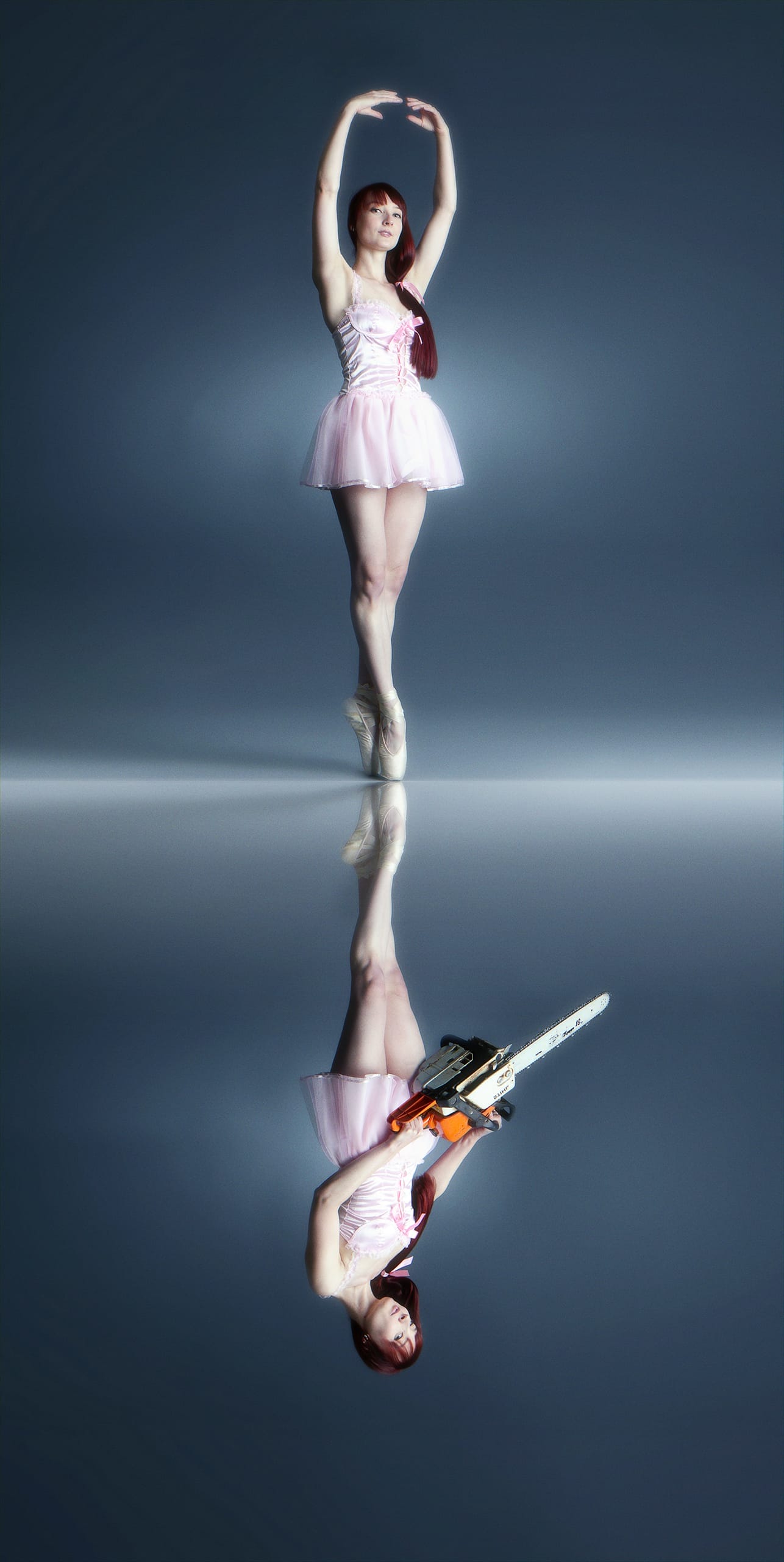 A ballerina stands en pointe against a grey background, wearing a pink tutu and holding her arms in a ballet position above her head. Below her is a mirrored reflection, except her reflection holds a chainsaw instead of posing gracefully, daring to hide the feelings behind the poised facade.