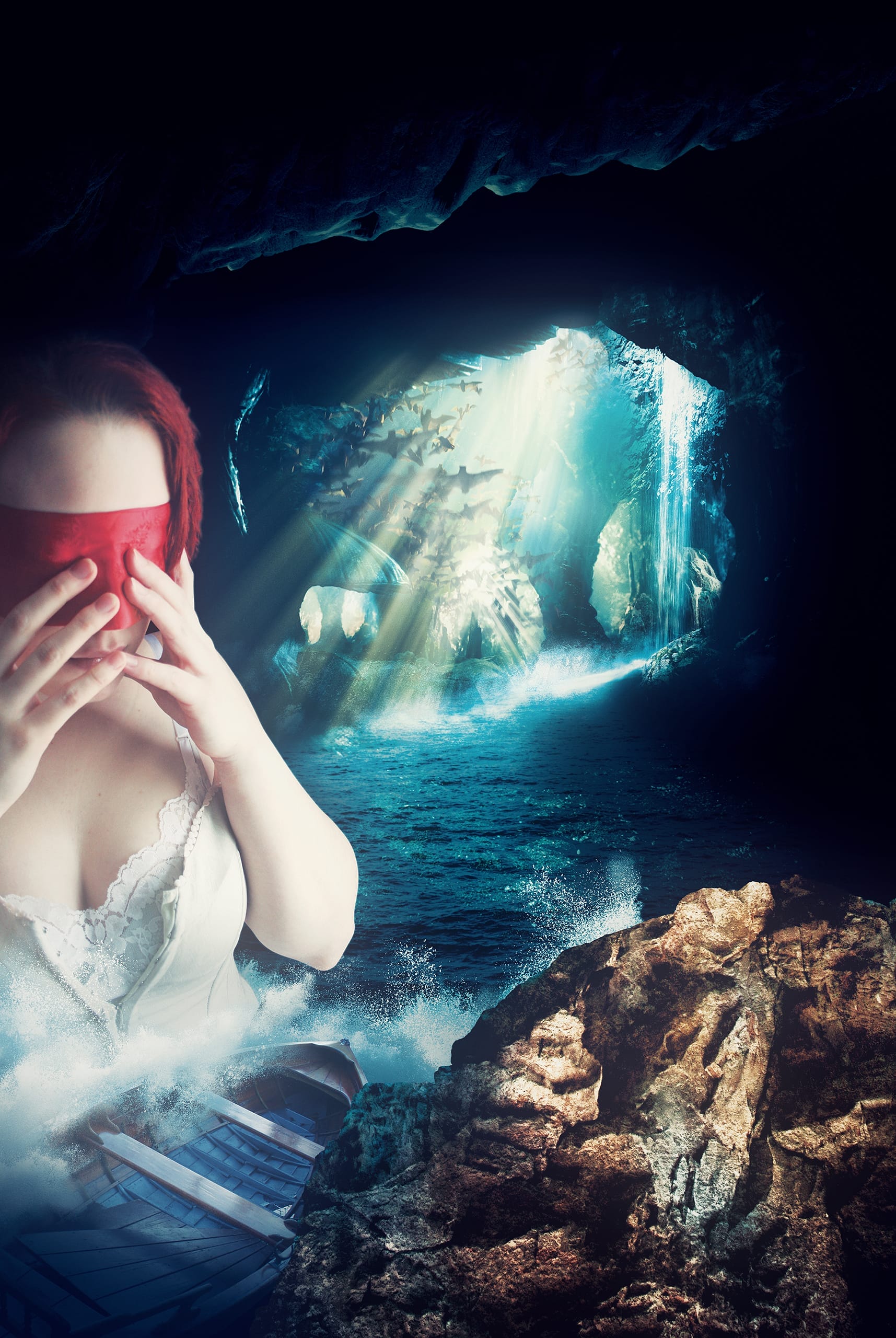 A person with red hair and light skin, dressed in a white lace garment, holds a red cloth over their eyes. Inside the dark cave, where sunlight streams in and illuminates the water and walls, creating a mystical atmosphere—we believe this scene captures an ethereal moment of introspection.