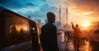 A person stands by a wet street at sunset under a glowing Zulu sky as another raises a hand near the bridge.