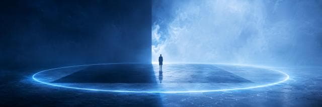 A person stands in the center of a glowing circle, facing mist as nature and reflection merge on the surface.